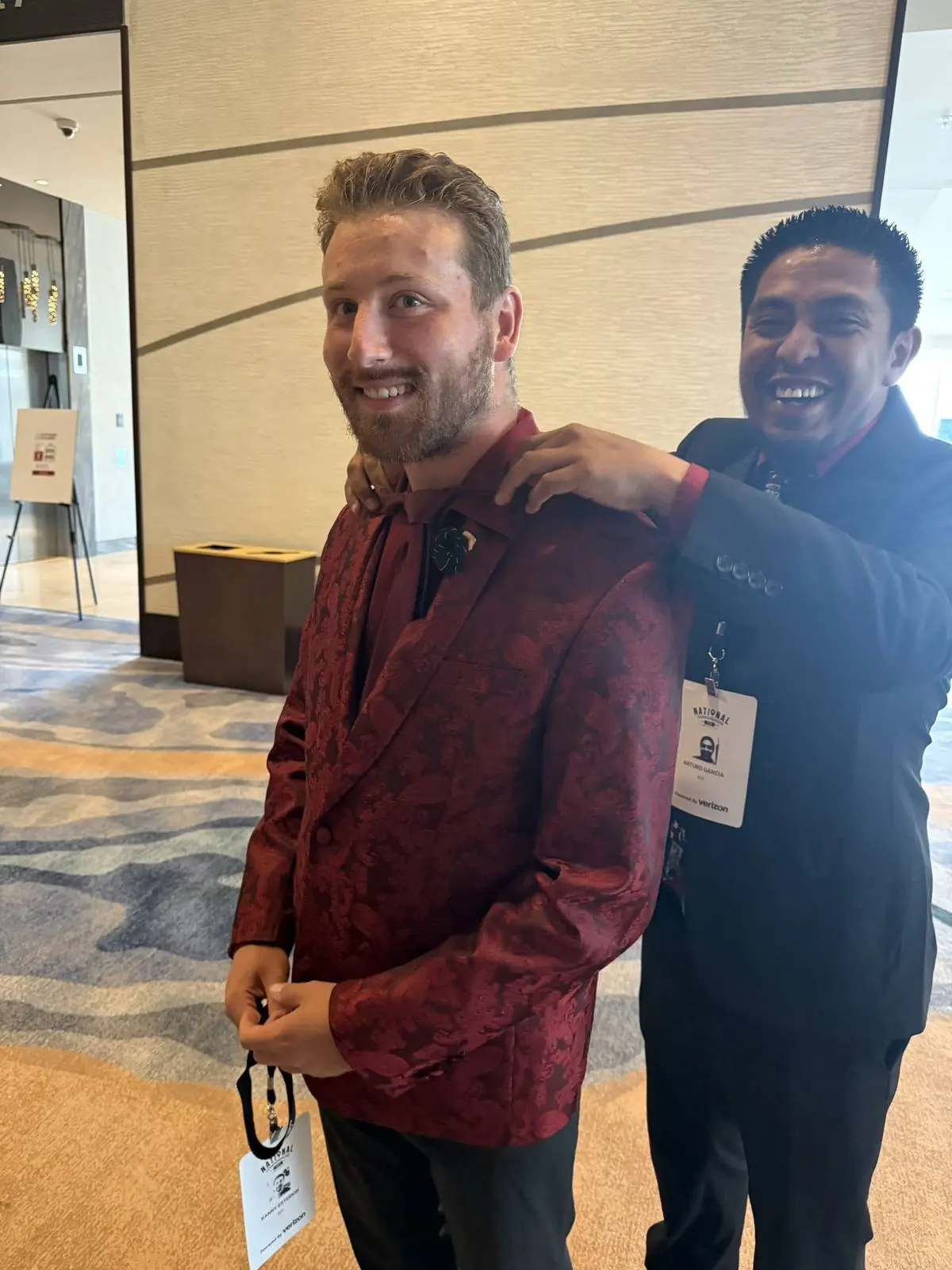Two Crosspath team members laughing together at the 2026 National Conference