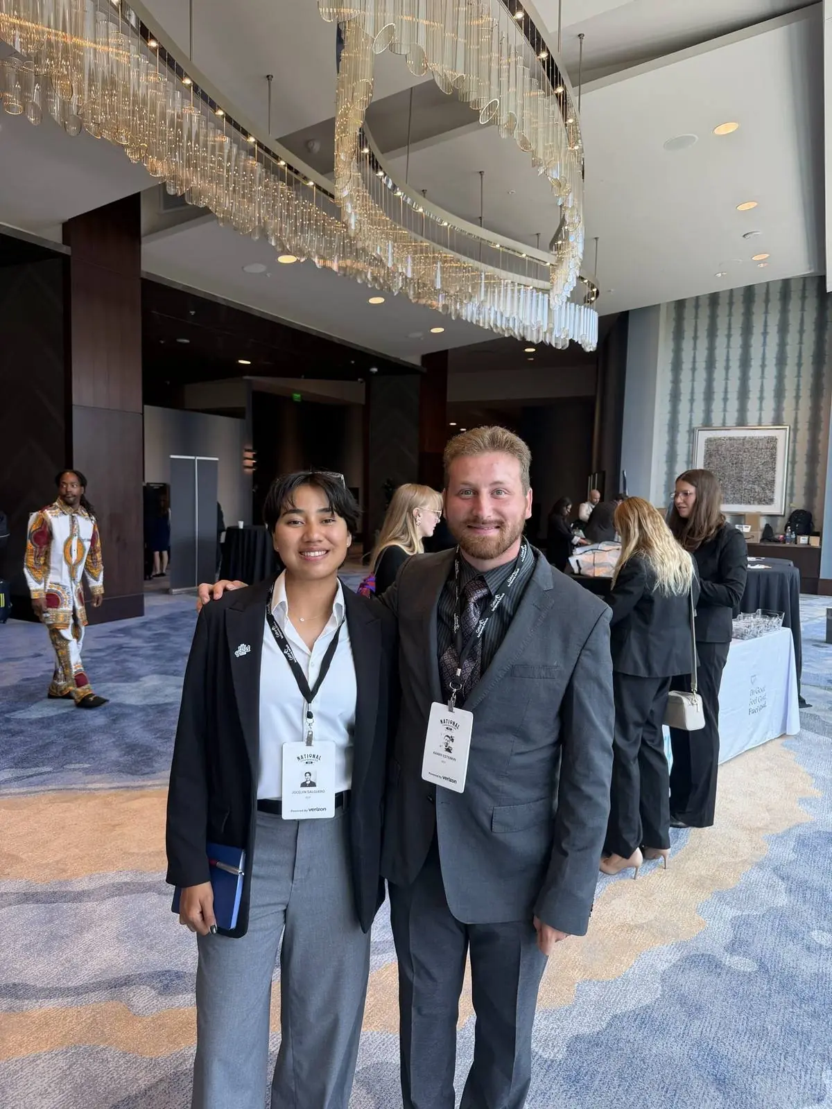 Two Crosspath representatives in the lobby of the 2026 National Conference